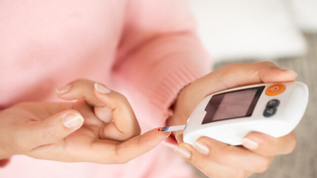 woman-hands-checking-blood-sugar-level-by-glucose-meter-diabetes-tester_53476-4748